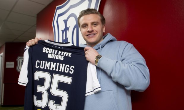 Jason Cummings is unveiled as a Dundee player.