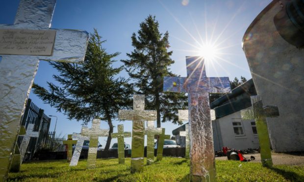 A ceremony held on International Overdose Awareness Day in 2018 displayed crosses to mark a record number of drug deaths in Dundee.