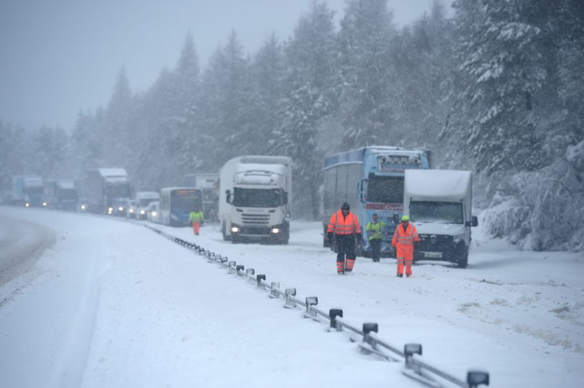 Heavy snow causing traffic difficulties on the A9 between Tomatin and Carrbridge in January 2021.