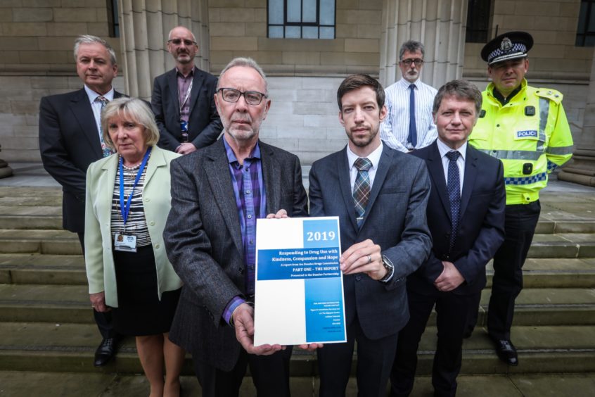 From left: David Martin, Trudy McLeay, David Lynch, Dr Robert Peat, Chairman of the Dundee Drugs Commission, John Alexander, Simon Little, Grant Archibald and Chief Superintendent Andrew Todd in 2019.