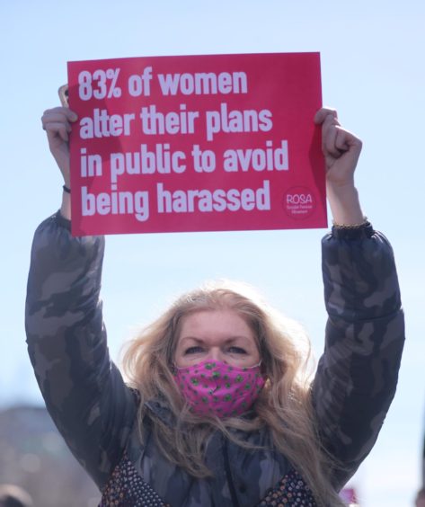 A demonstrator at a protest in Dublin organised in remembrance of Sarah Everard.