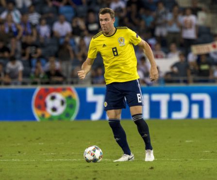 Kevin McDonald in action for Scotland against Israel.