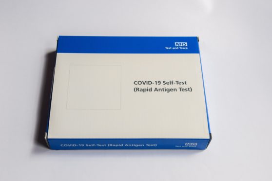 A box containing a covid rapid lateral flow test