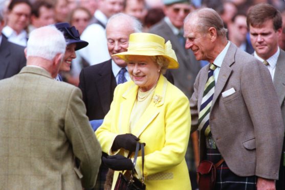 The Queen and Prince Philip arrive at Braemar Gathering.