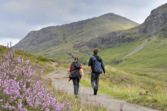 To go with story by Lauren Robertson. The National Trust for Scotland have announced the staggered reopening of their heritage sites from April 26. Picture shows; Walkers in Glencoe. Glencoe. Supplied by National Trust for Scotland Date; Unknown