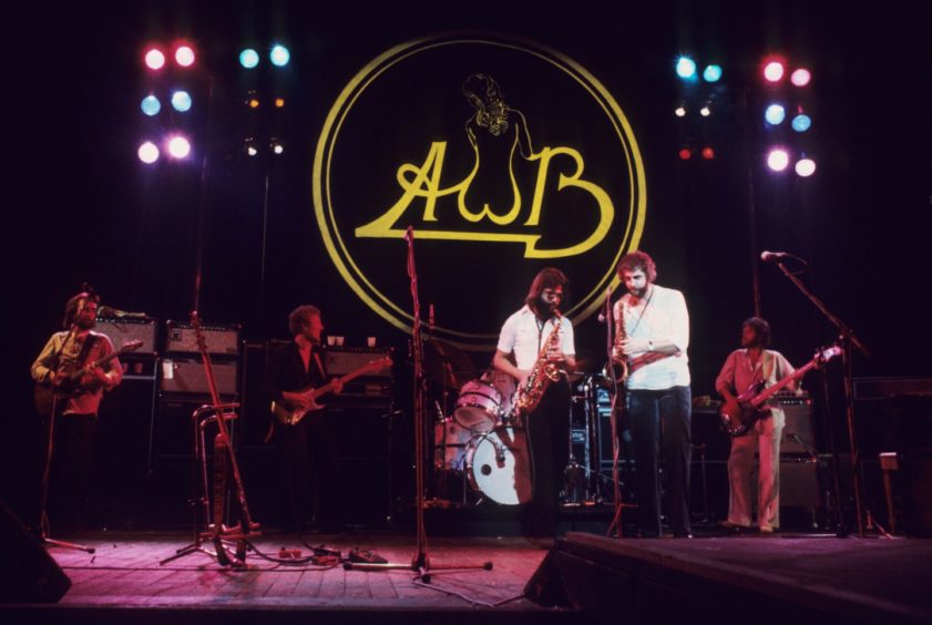 Hamish Stewart, Alan Gorrie, Onnie McIntyre, Malcolm Duncan and Roger Ball performing in concert as the Average White Band in 1976.