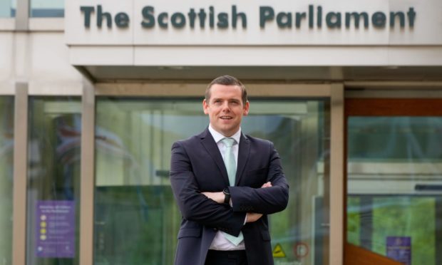 Scottish Conservative & Unionist Party Leader Douglas Ross photographed outside the Scottish Parliament building.