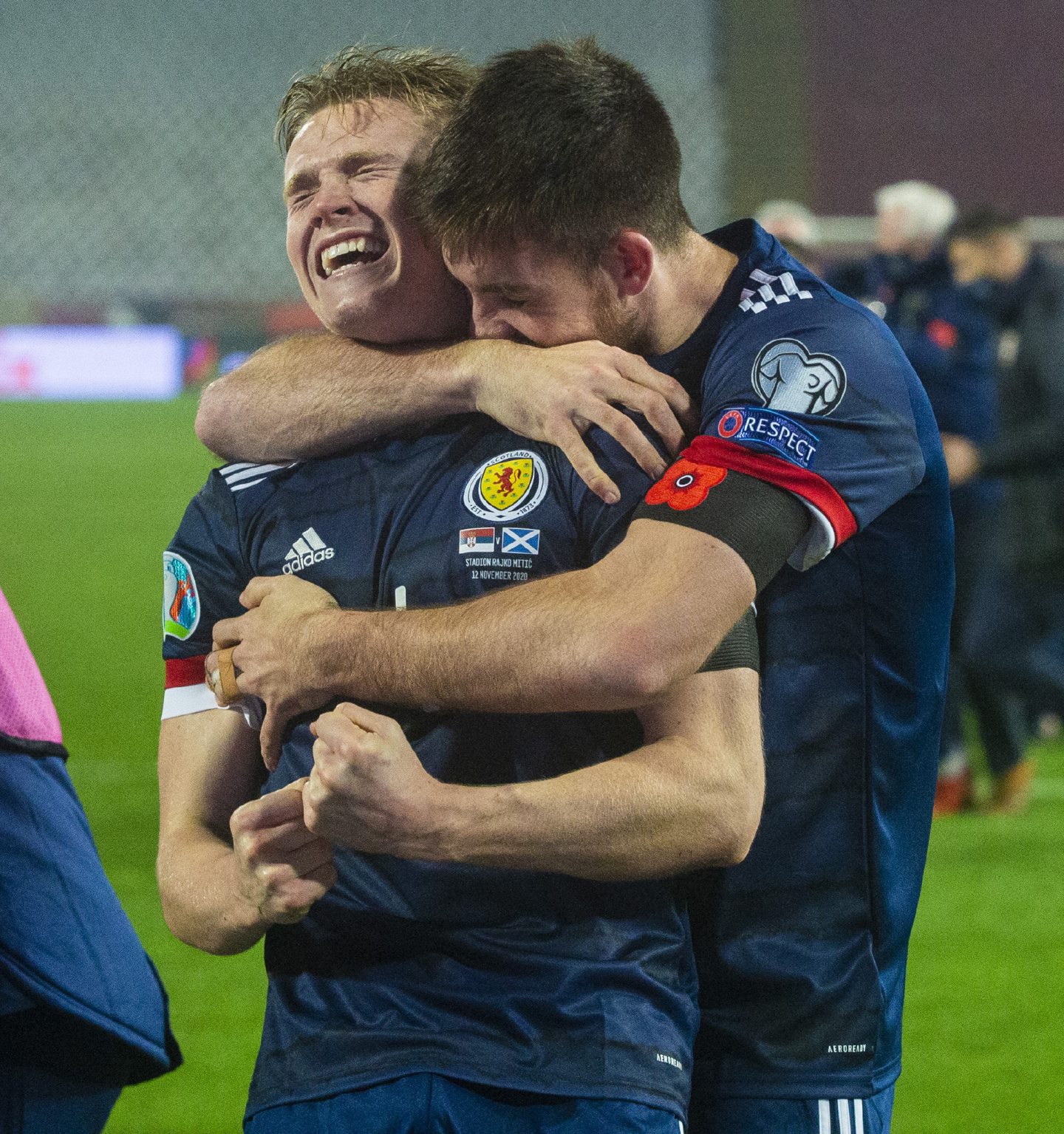 Scotland's Scott McTominay (left) and Declan Gallagher celebrate after David Marshall saves Aleksandar Mitrovic's penalty during the UEFA Euro 2020 Qualifier against Serbia.