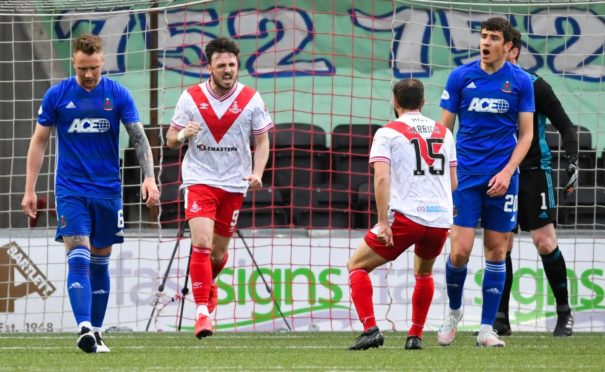 Airdrie's Calum Gallagher (centre) celebrates making it 1-1 against Cove.