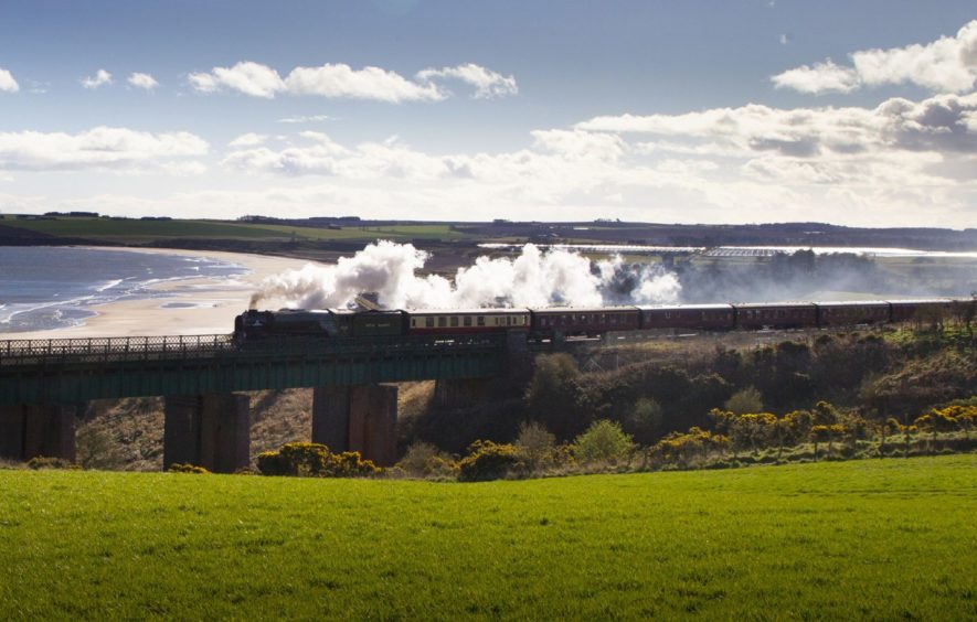 The steam train Tornado making its way past Lunan Bay. Pic: Paul Reid.