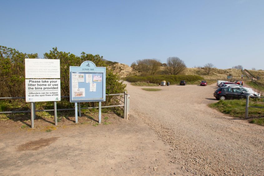 The beach car park.