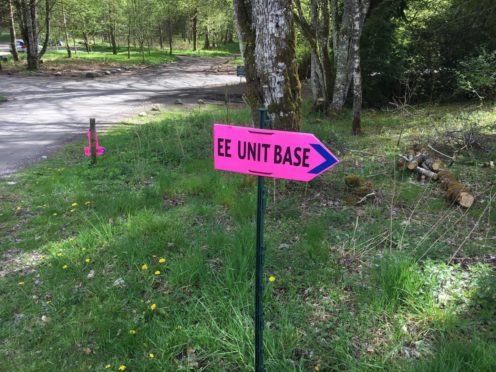 A pink sign reading 'EE Unit Base' in Blair Atholl