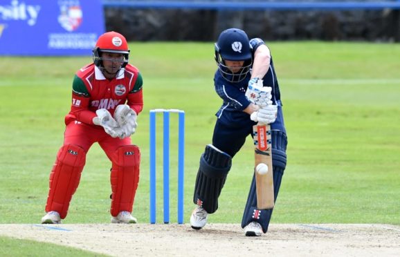 Matthew Cross in action for Scotland against Oman at Mannofield in 2019.