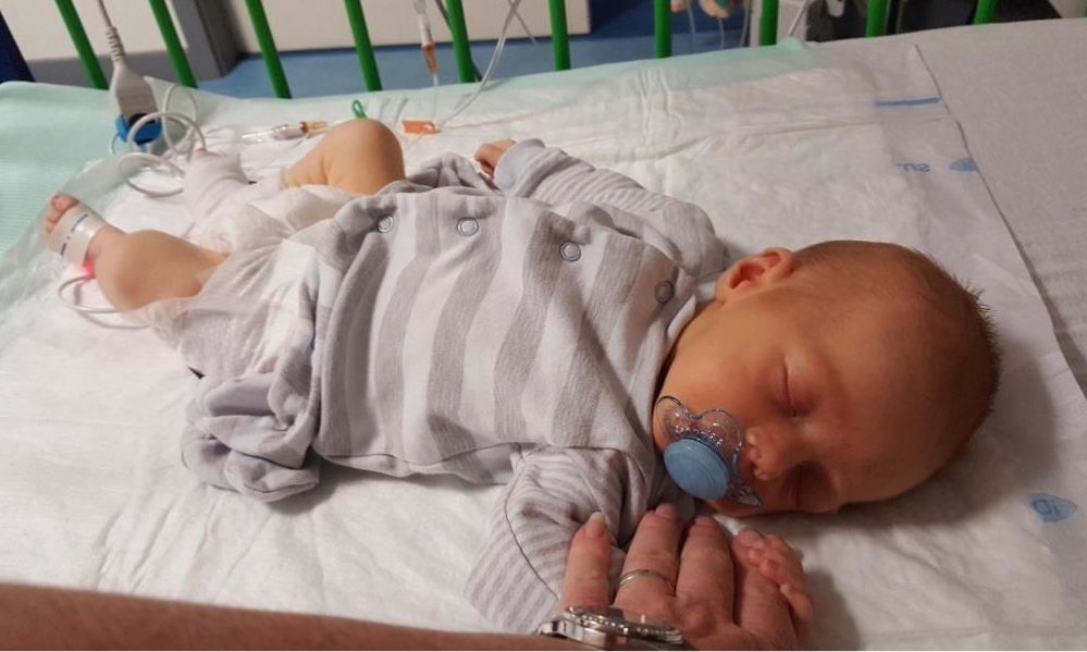 Harris was very ill with sepsis and meningitis as a baby - his mum is warning new parents to be on the lookout for symptoms.