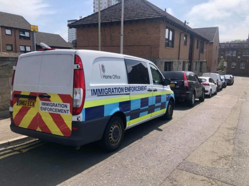 An Immigration Enforcement van was on the scene near to Lochee High Street.
