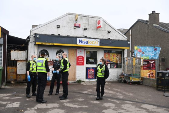 Police outside the Nisa store on Hayton Road
