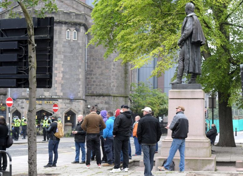 A Black Lives Matter protest around the war memorial statue in Aberdeen