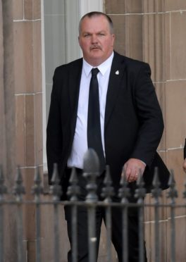 Lorry driver Christopher Penfold leaving court during his trial in 2019.