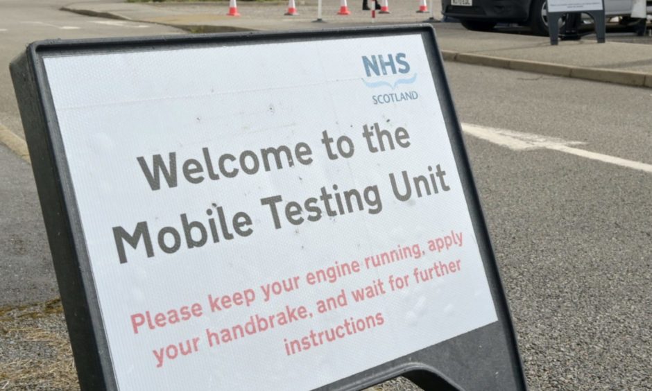A mobile testing unit sign