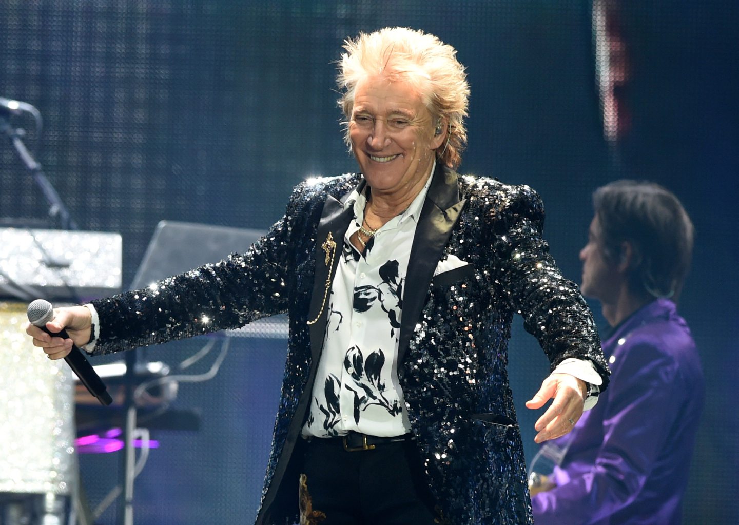Rod Stewart performing live on stage