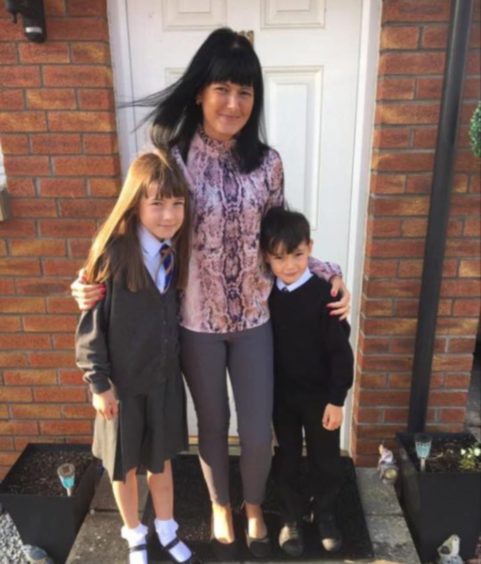 Dundee mum Claire Davidson, with her daughter Zara and son Jack, says the rules over self-isolation are confusing.