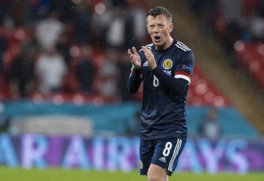 Callum McGregor, a former team-mate of Scott Brown at Celtic, applauds the fans at full-time.