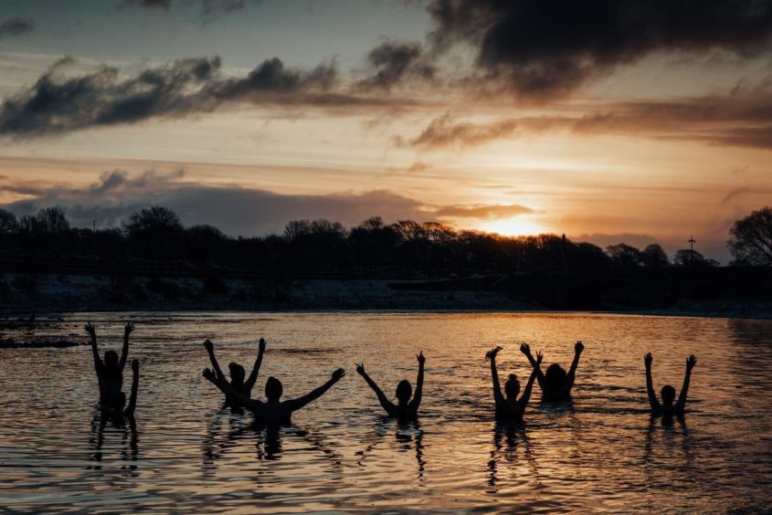 The Wet Bandits swimming group in the River Dee.