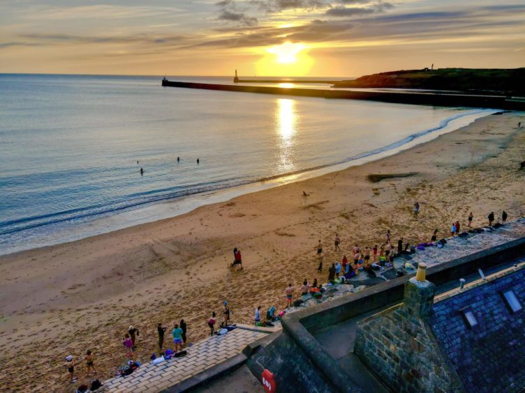 The Wet Bandits wild swimming group at Aberdeen Beach. 