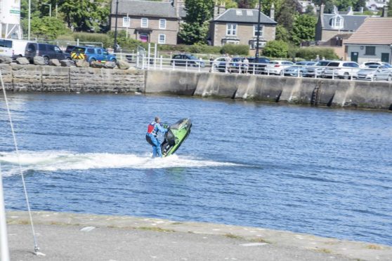 Jet-skiers in Broughty Ferry harbour.