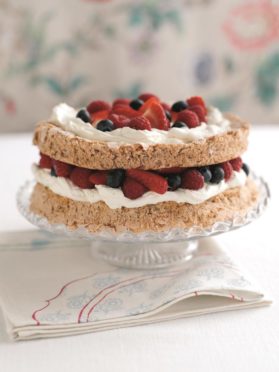 Macaroon cake with mixed berries.