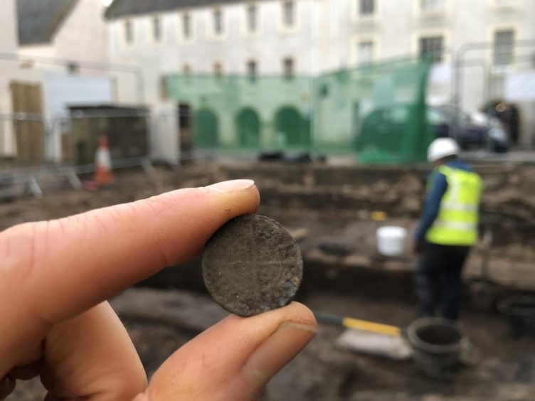 Medieval coins were among the items recovered from the site.
