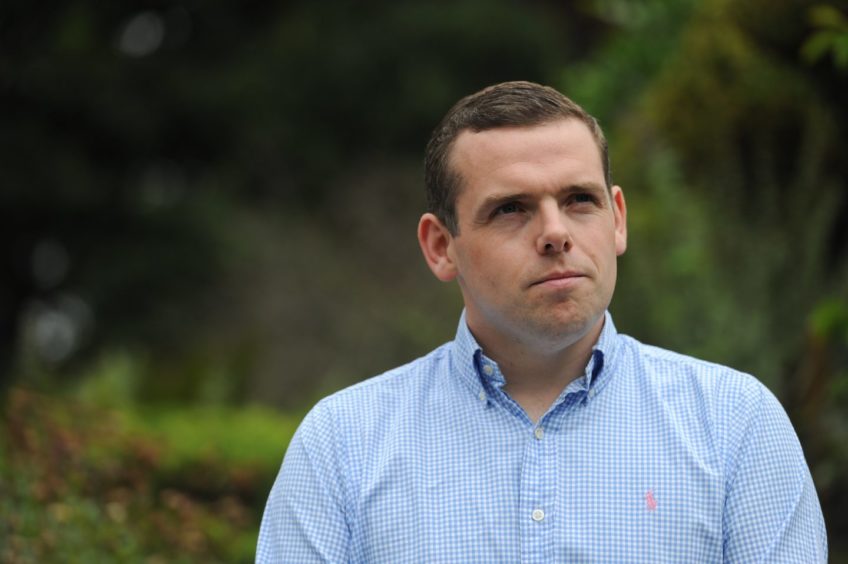 Douglas Ross, who has been urged to sack the Tory councillor behind the account.