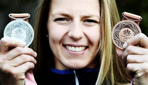 Neah Evans with her silver and bronze medals from the Commonwealth Games in 2018.