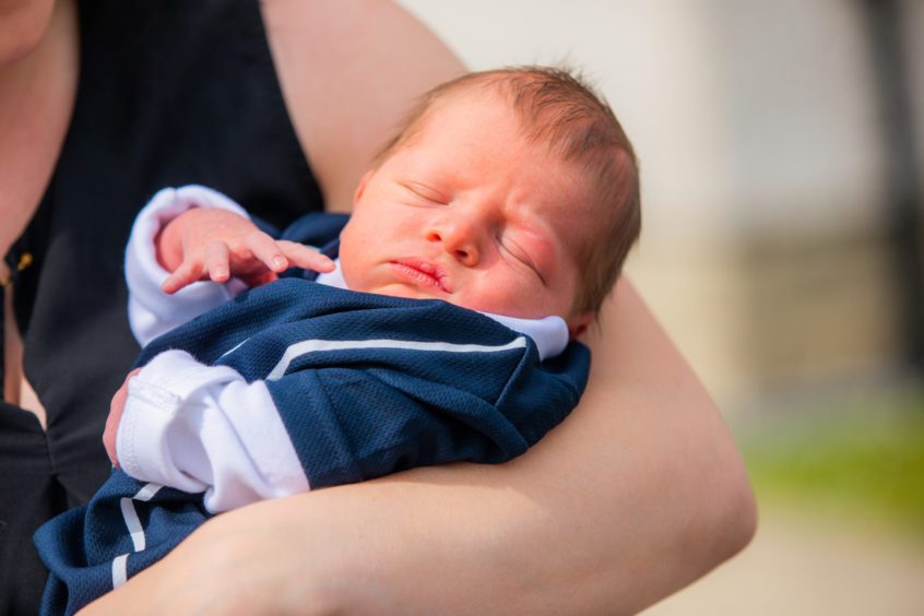 Baby Liam who was born just hours before Scotland played England