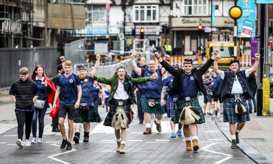 Fans arriving at Wembley Stadium ahead of England v Scotland.