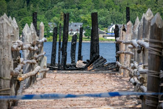 A close-up image of the charred remains of the Crannog Centre fire