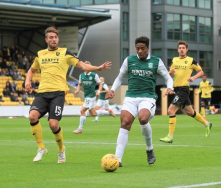 Morgyn Neill, left, in action for Livingston, with Declan Gallagher in the background.