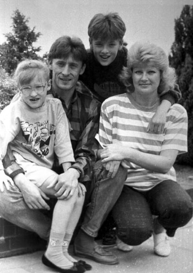 Sergei and his wife Olga and children Sergei and Elena in 1990.