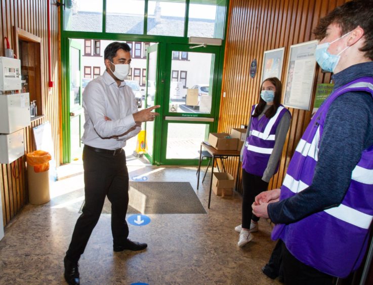Humza Yousaf, Cabinet Secretary for Health and Social Care visited the Covid vaccination centre at Arbroath's community centre in July. 