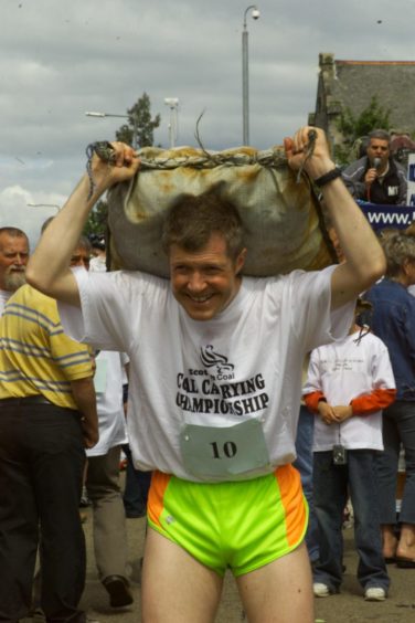 Willie Rennie running in the Scottish Coal Carrying Championship in Kelty.