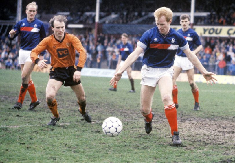 John Brown in action for Dundee during his successful spell at Dens. Image: SNS.