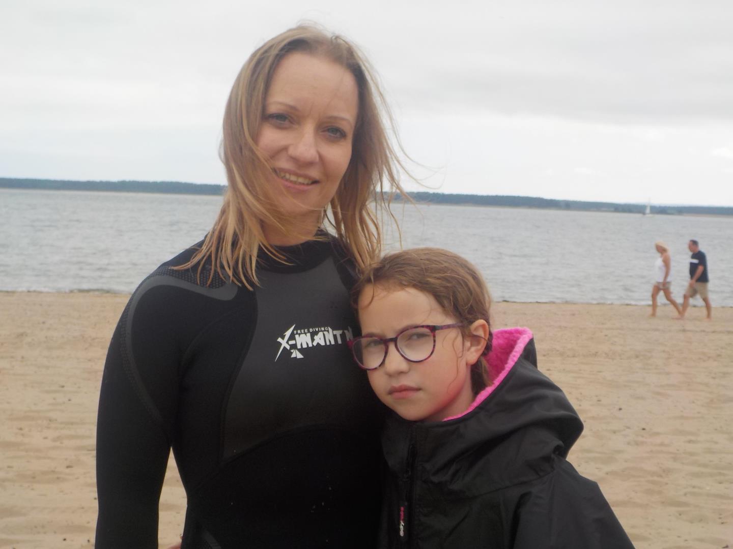 Lucy Scott in wetsuit with daughter Anna