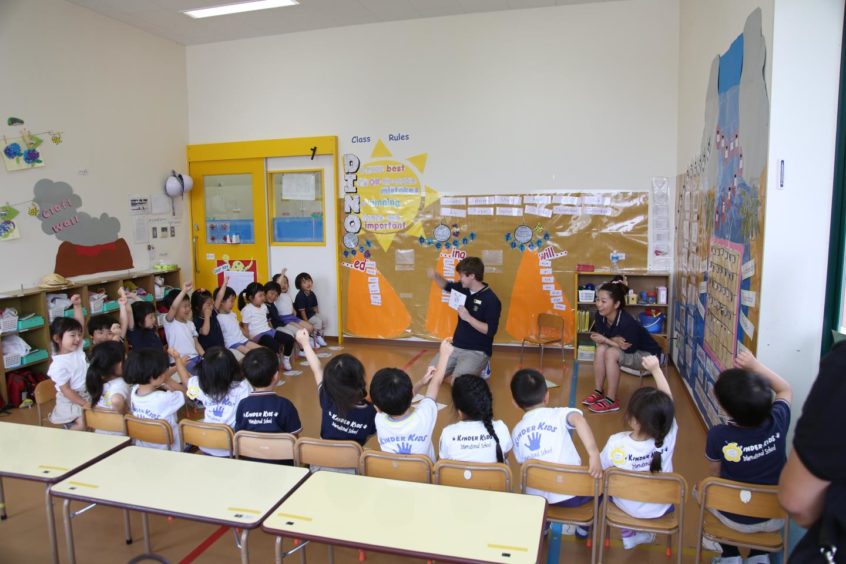 Chris teaching in Japan.