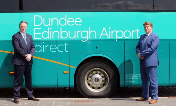 Sandy and James Easdale, of McGill's Buses, with the Dundee to Edinburgh Airport bus service.