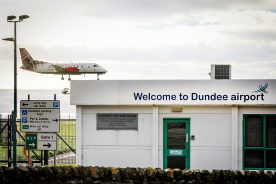 Plane flying into Dundee Airport.
