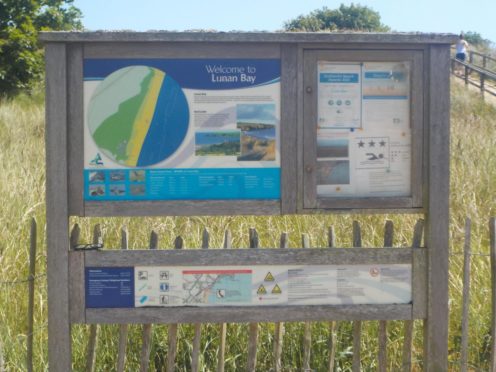 Sign welcoming guests to Lunan Bay.