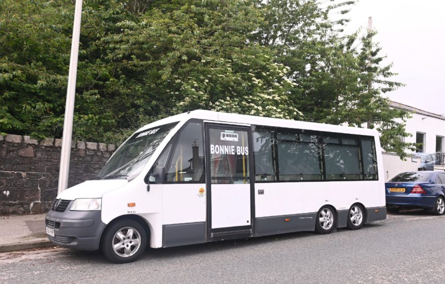 The Bonnie Bus parked on the street.