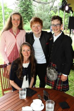 Angus teen William and his family, with singer Ed Sheeran.