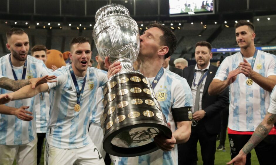Lionel Messi kisses the Copa America trophy after Argentina beat Brazil in the final last month.