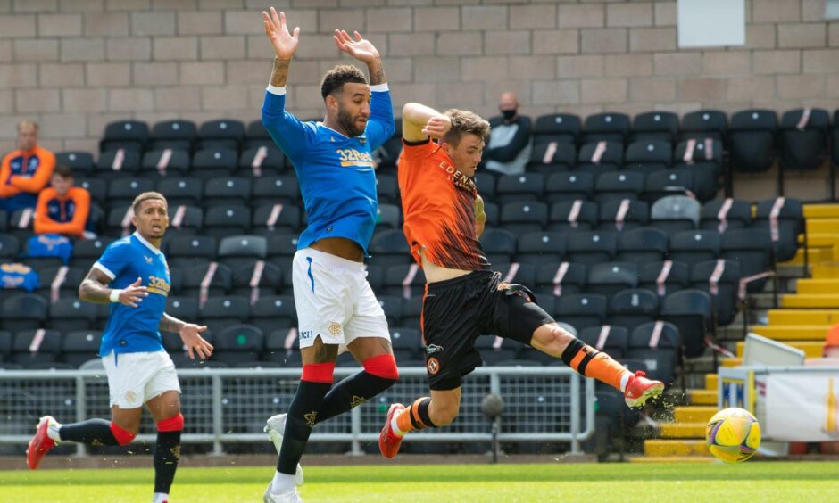 Jamie Robson gets in front of Rangers defender Connor Goldson to score in a recent 1-0 win for Dundee United over the champions at Tannadice.
